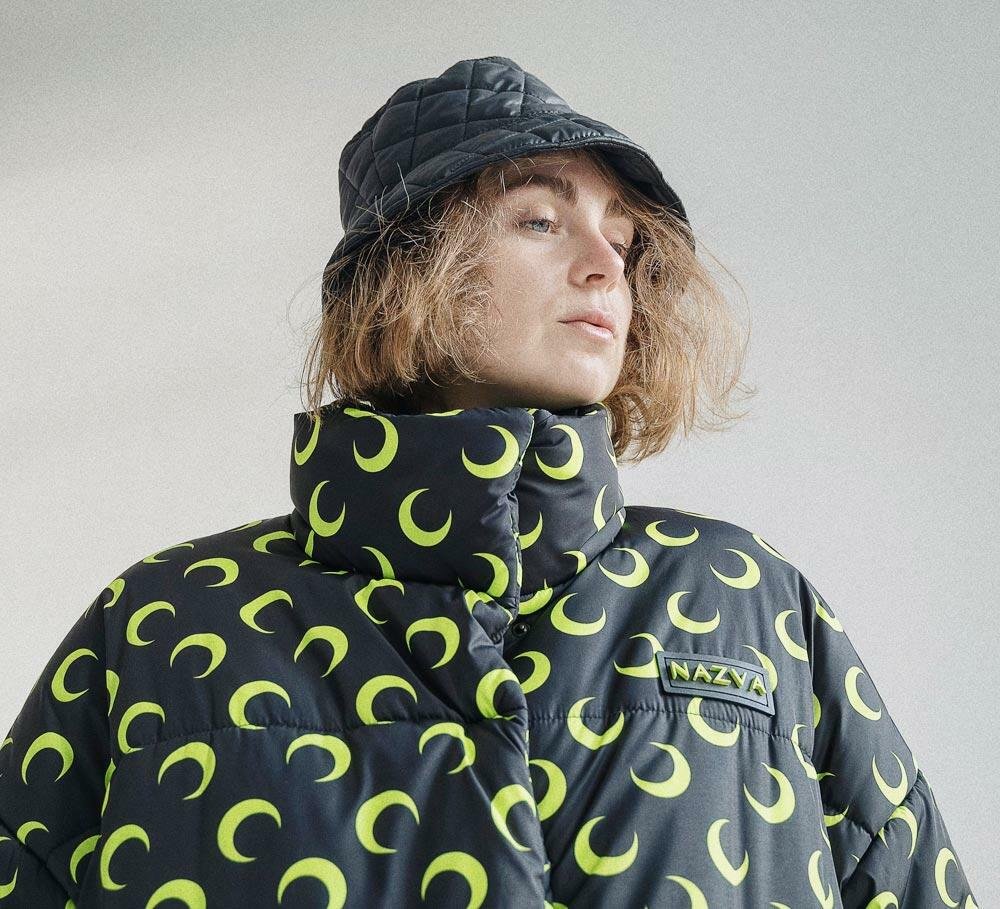 Woman Wearing a Black and Green Jacket (Demo)