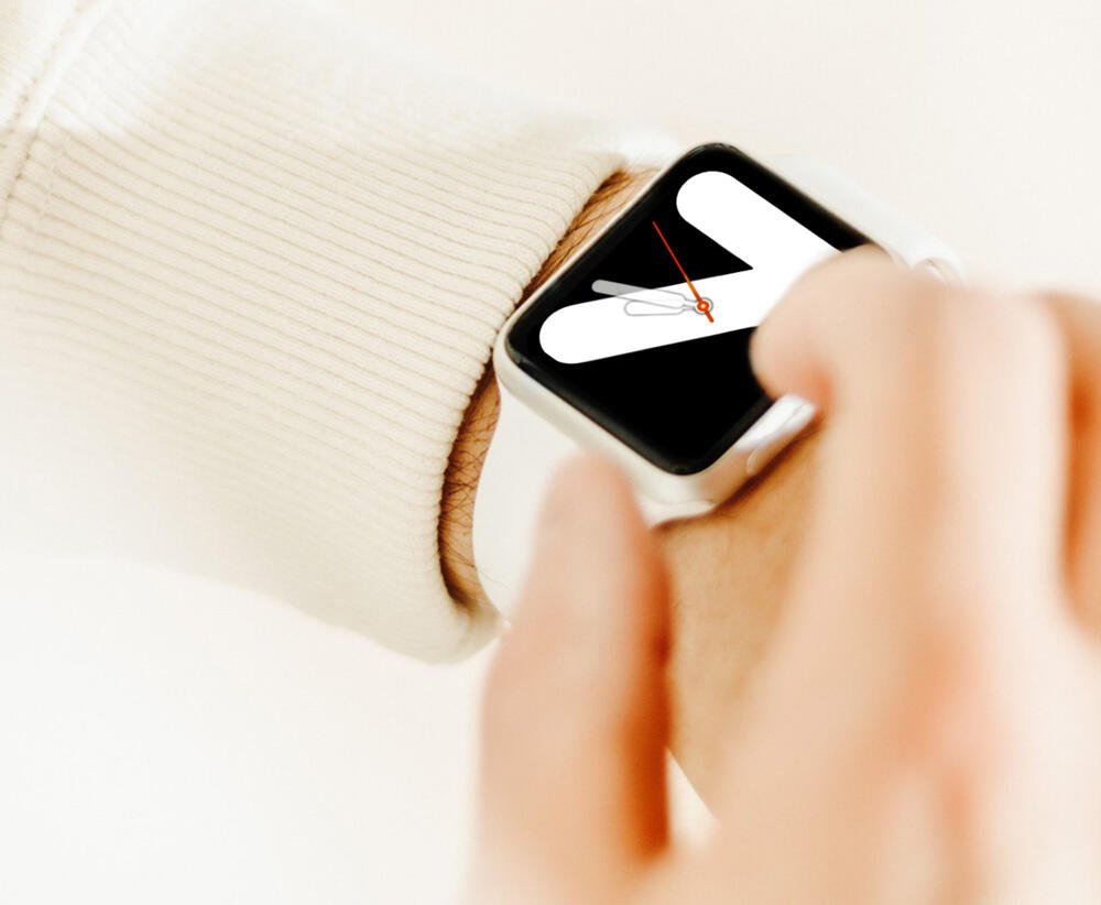 Person Holding a Smart Watch in Their Hand (Demo)